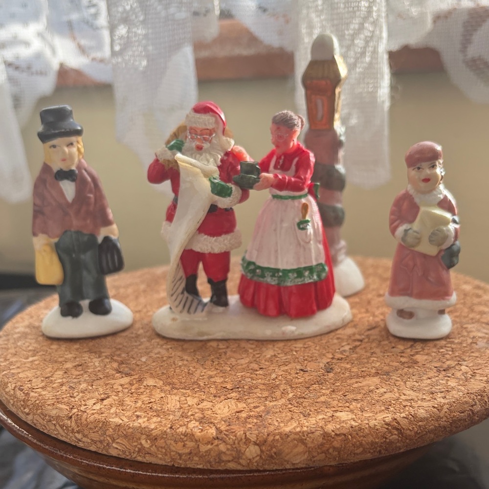Charming Holiday Figurine Set with Santa and Carolers